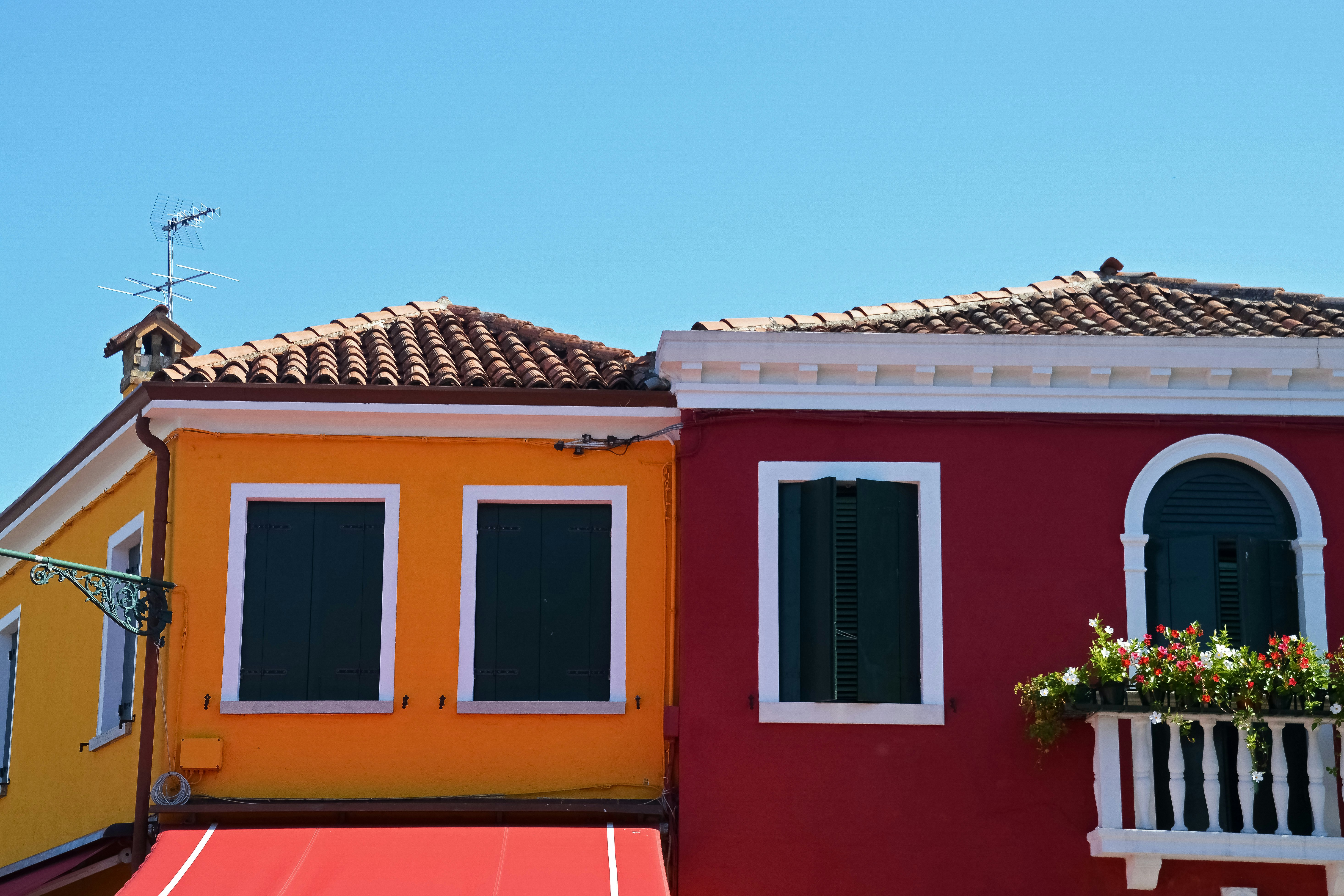 red and yellow concrete house